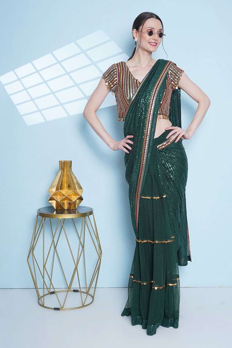 Emerald Green chiffon and tulle tiered sari, embellished with coin embroidered corset.