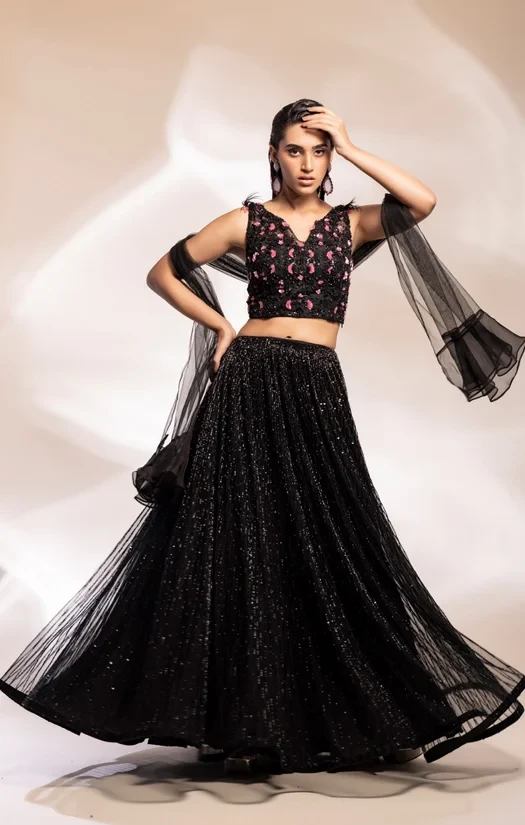 Black Beaded choli blouse worn with full bodies skirt and stole